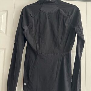 Lululemon black activewear long sleeve zip top. Size 10.